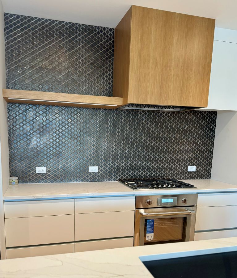 new kitchen range with tile backsplash Loveland Colorado home renovation