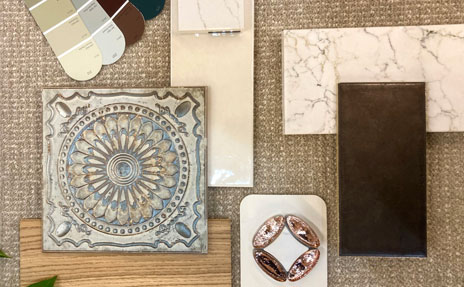 woodlook and marbled tile flooring in design flatlay